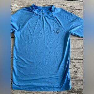 Like new. Rash guard - Boys XL (16).
